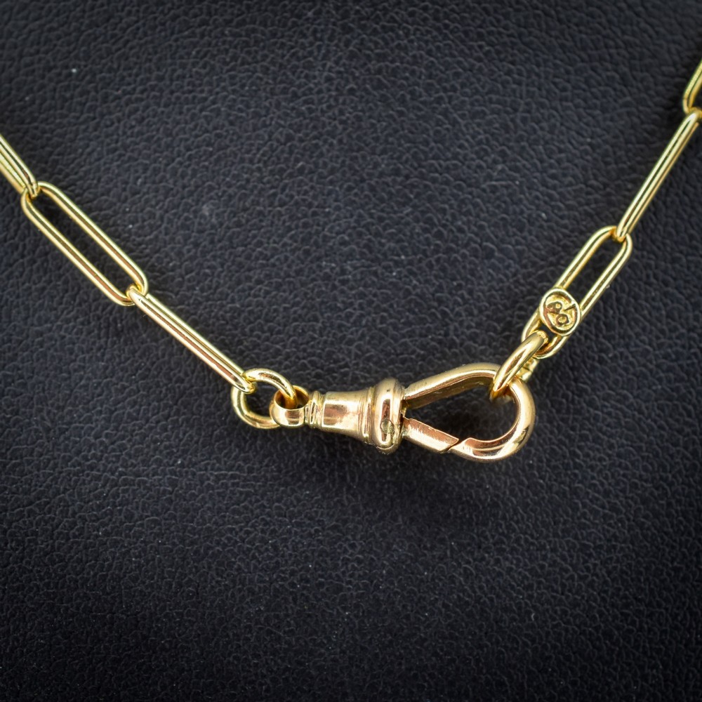 An antique 9ct yellow gold chain featuring elongated paperclip links and a swivel dog clip clasp. View III
