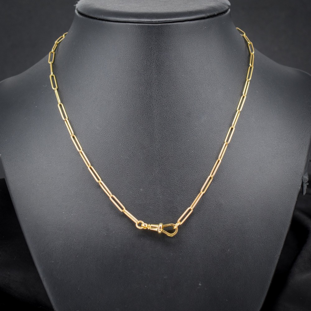 An antique 9ct yellow gold paperlink chain necklace featuring uniform elongated rectangular links and a swivel dog clip clasp. View II