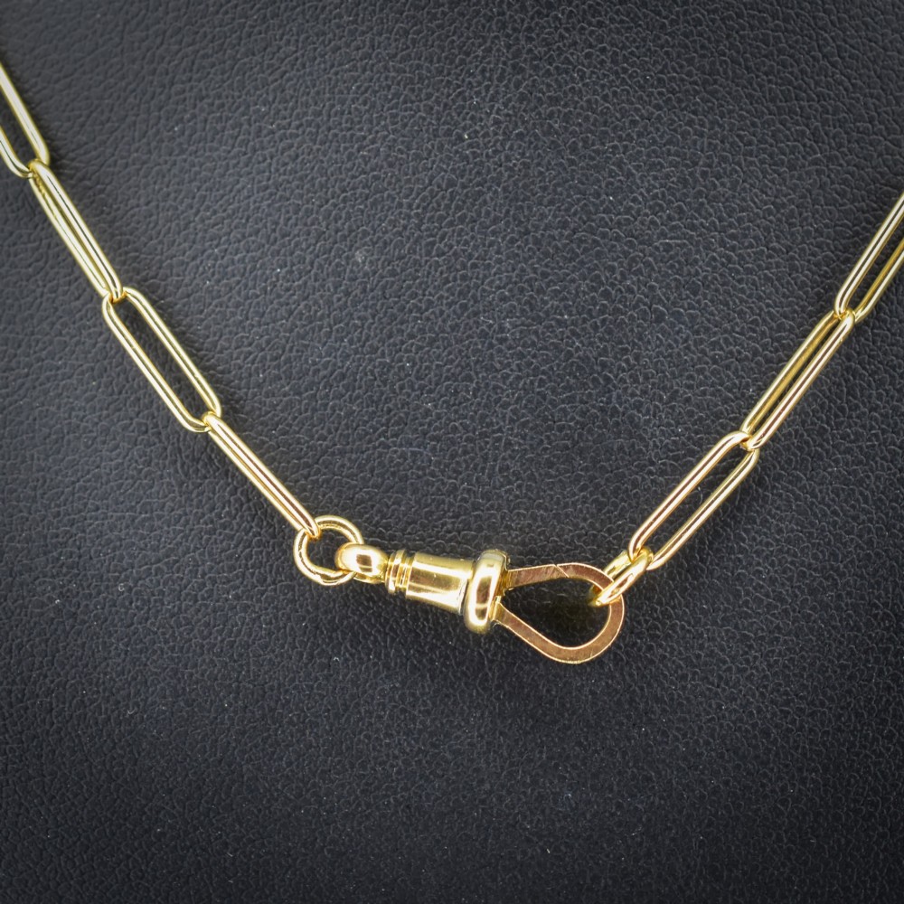An antique 9ct yellow gold paperlink chain necklace featuring uniform elongated rectangular links and a swivel dog clip clasp. View III