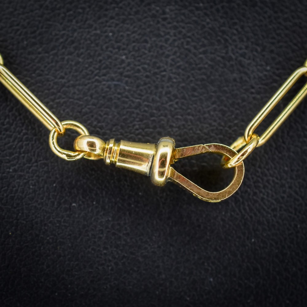 An antique 9ct yellow gold paperlink chain necklace featuring uniform elongated rectangular links and a swivel dog clip clasp. View IV
