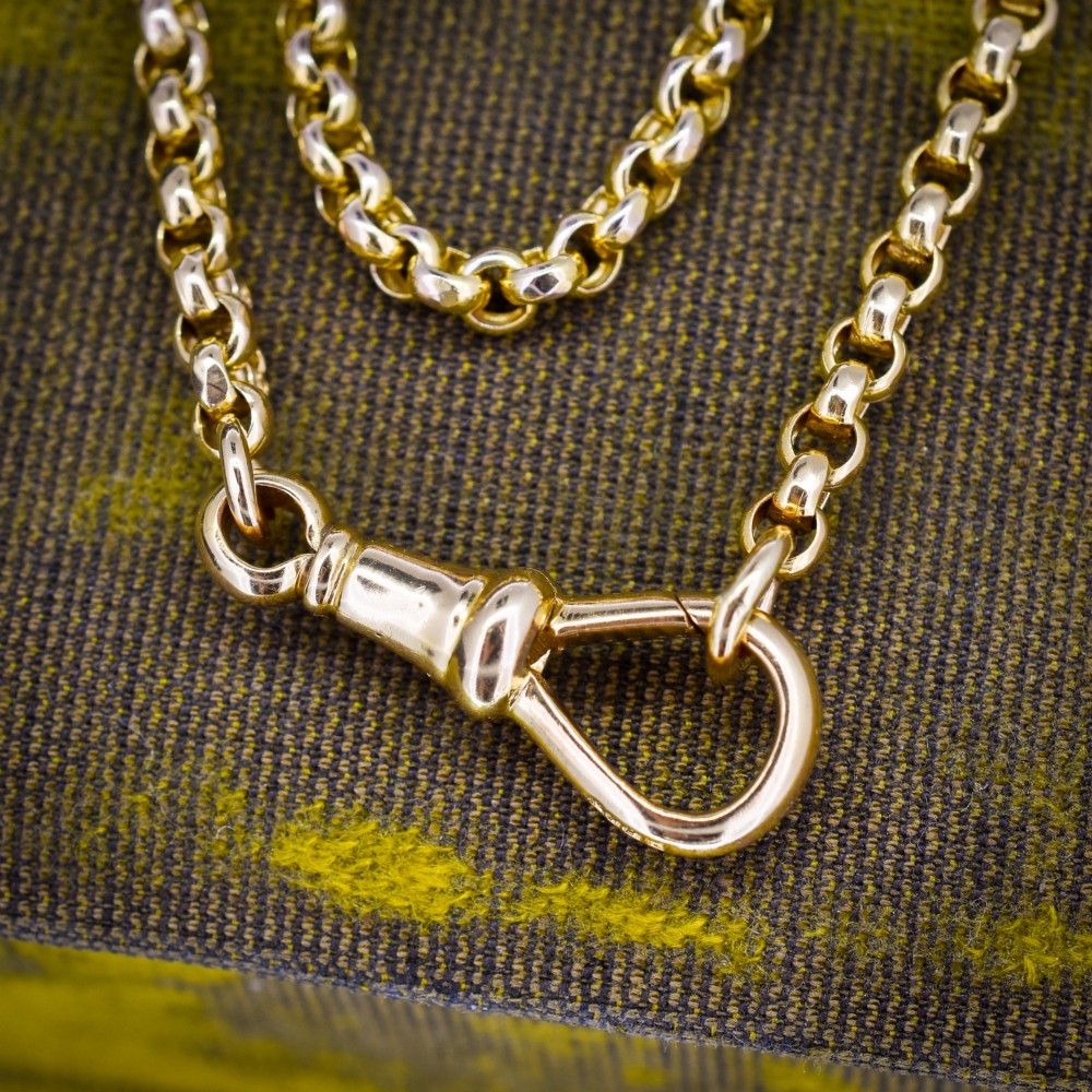 An antique Victorian 9ct yellow gold belcher link chain necklace featuring a dog clip clasp fastener. View VI