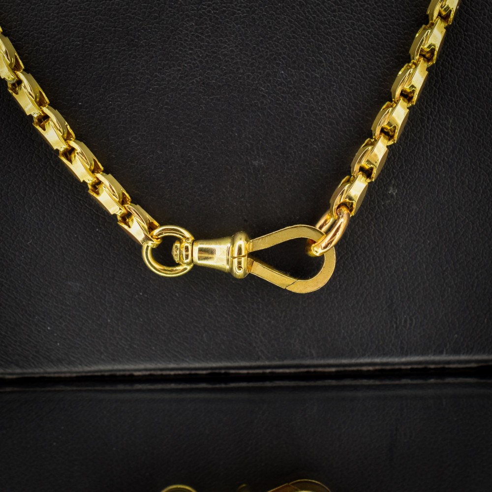 An antique 9ct yellow gold tulip link fancy chain necklace featuring a traditional dog clip fastener. View III