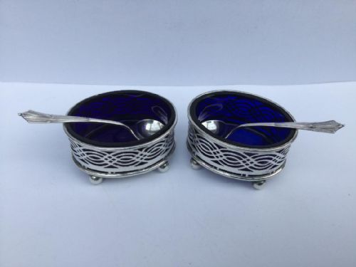 A PAIR OF LATE VICTORIAN SILVER SALTS