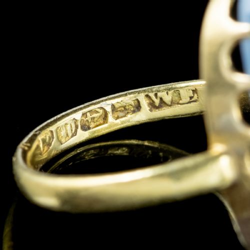 fig 2. An antique Victorian ring featuring a large oval cabochon moonstone set in a multi-claw yellow gold mounting.