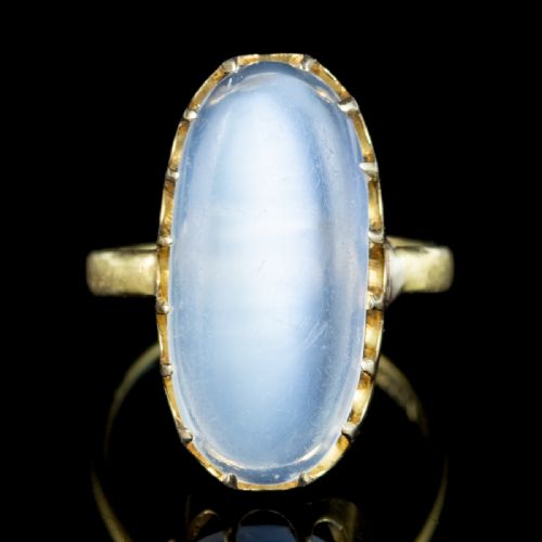 fig 4. An antique Victorian ring featuring a large oval cabochon moonstone set in a multi-claw yellow gold mounting.