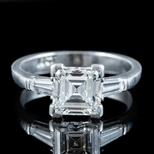 fig 3. An Art Deco platinum ring featuring a central square step-cut diamond flanked by two tapered baguette diamonds.