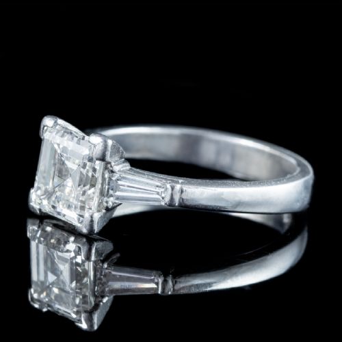 fig 5. An Art Deco platinum ring featuring a central square step-cut diamond flanked by two tapered baguette diamonds.