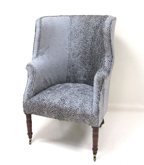 Upholstered Antique Wing Armchair
