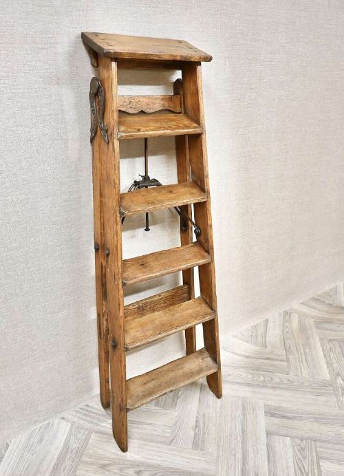 A vintage pine A-frame step ladder featuring wooden treads, iron side braces, and a top platform. View VIII