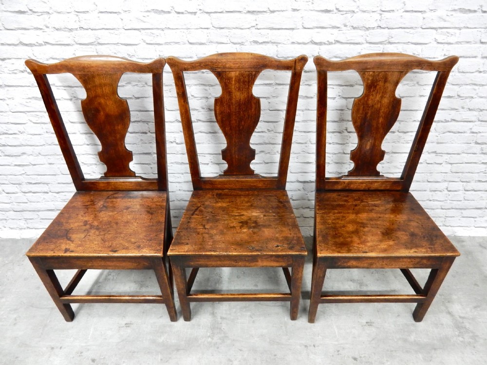 Set of Seven Oak Dining Chairs View V