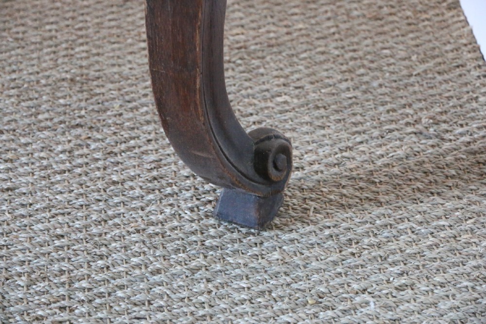 A rectangular dark oak table featuring an inlaid parquet pattern top, a scalloped apron, and sweeping cabriole legs with scroll feet. View IX
