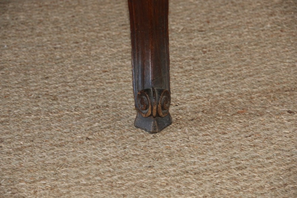 A rectangular dark oak table featuring an inlaid parquet pattern top, a scalloped apron, and sweeping cabriole legs with scroll feet. View X