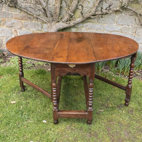 C17TH LATER SMALL OAK OVAL GATELEG COUNTRY DINING TABLE - ADDITIONAL PHOTO 4
