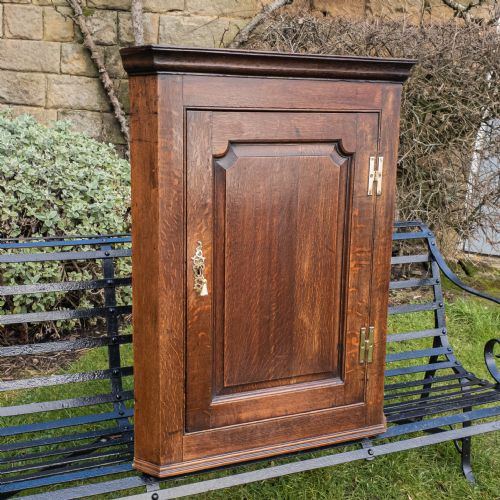 georgian oak panelled wall hanging corner cabinet - CATEGORY: ANTIQUE CUPBOARDS - DATED 18TH CENTURY