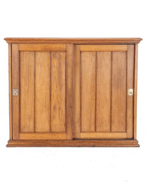 solid oak sliding panel door cabinet c1930 antique - CATEGORY: ANTIQUE CUPBOARDS - DATED 1930