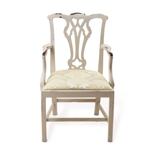 fig 1. A Georgian Chippendale style armchair featuring an off-white painted finish with visible distressing, a pierced back splat, and a patterned fabric seat.