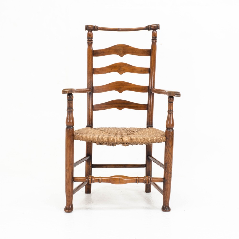 C19th Macclesfield Elm & Ash Country Ladderback Rush Seat Carver Armchair View II