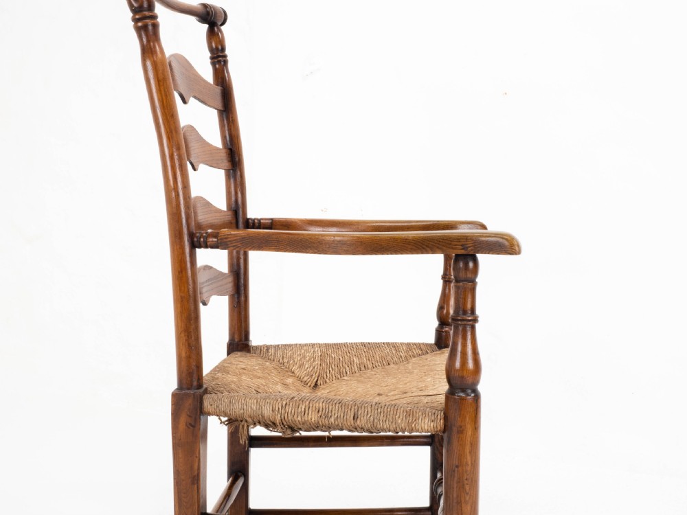 C19th Macclesfield Elm & Ash Country Ladderback Rush Seat Carver Armchair View X