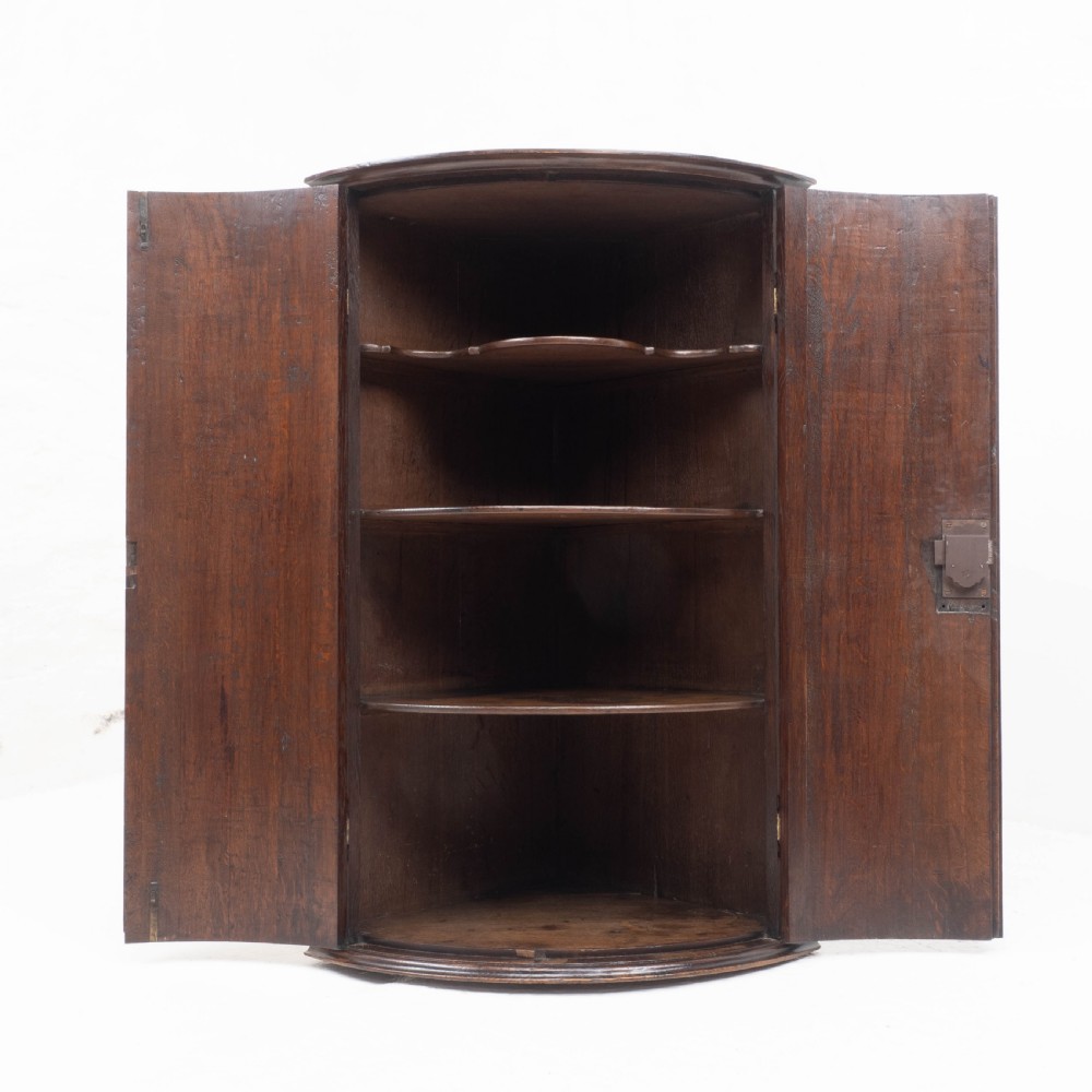 George III Oak Bow Front Wall Hanging Corner Cabinet (Georgian) View IX