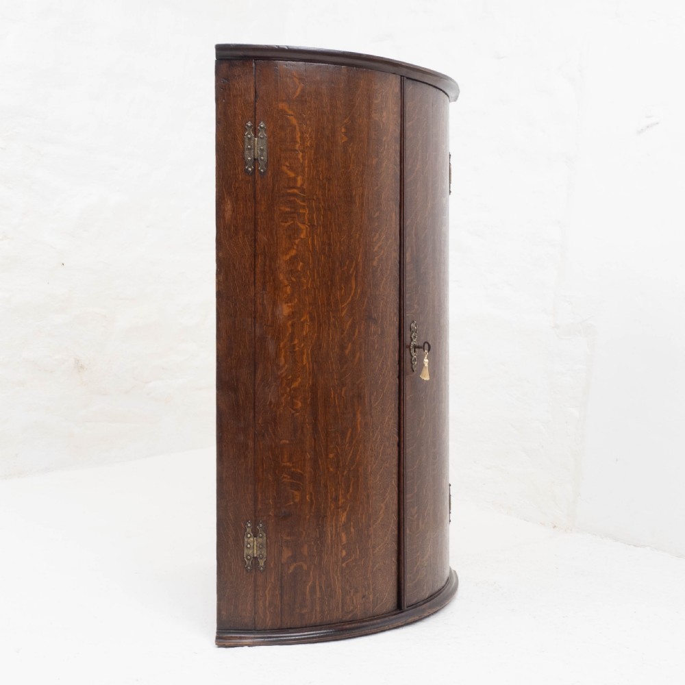 George III Oak Bow Front Wall Hanging Corner Cabinet (Georgian) View XVIII