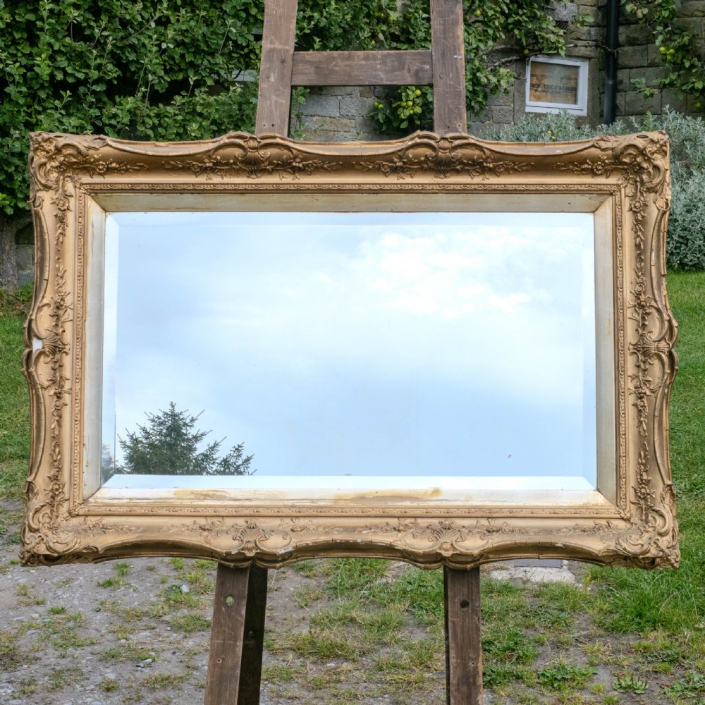 Early c.19th Baroque Gilt Flared Frame with later Mirror (Georgian)