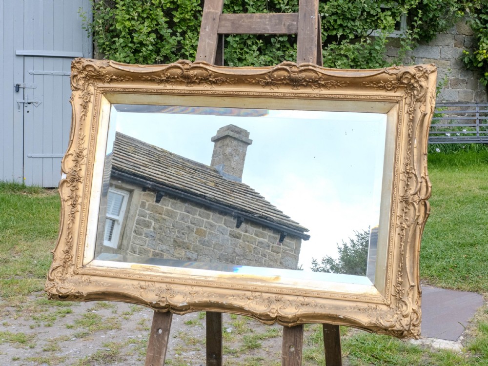 Early c.19th Baroque Gilt Flared Frame with later Mirror (Georgian) View II