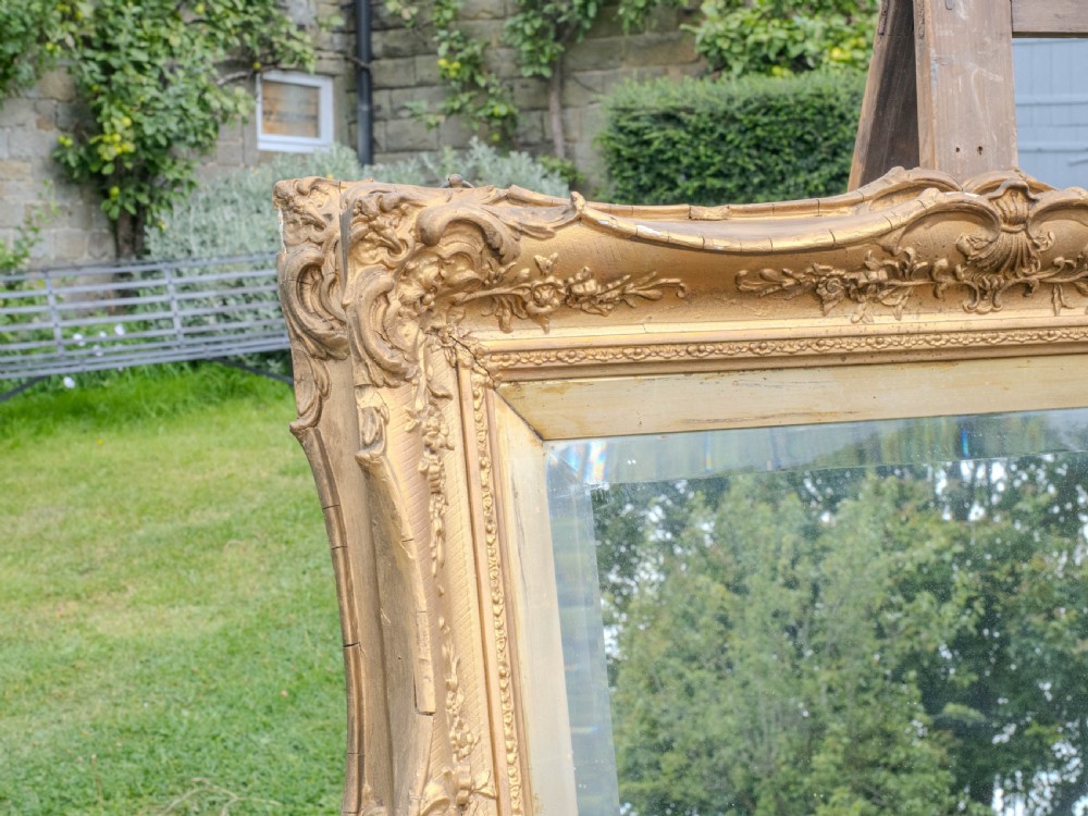 Early c.19th Baroque Gilt Flared Frame with later Mirror (Georgian) View X