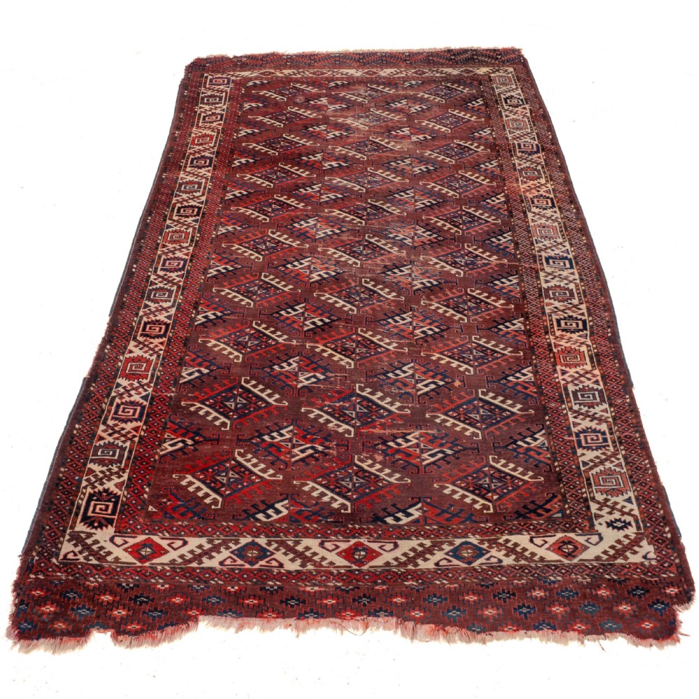 Antique 19th Century Yomut Turkmen Hand-woven Carpet with Dyrnak Guls, 301 × 174 cm (9'11