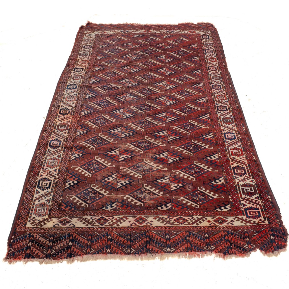 Antique 19th Century Yomut Turkmen Hand-woven Carpet with Dyrnak Guls, 301 × 174 cm (9'11