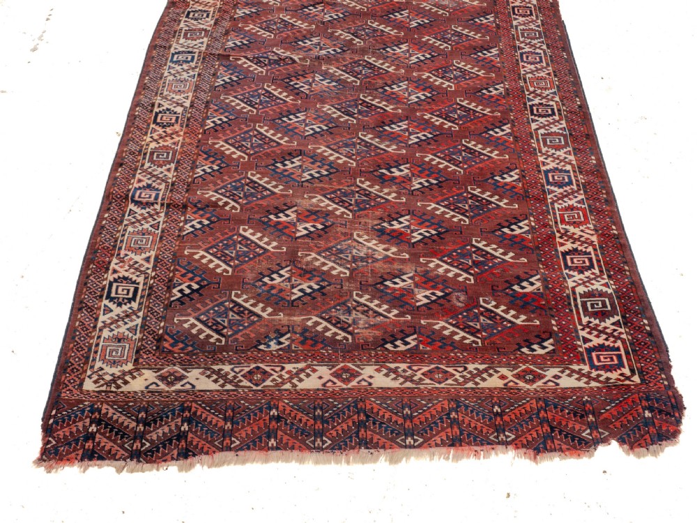Antique 19th Century Yomut Turkmen Hand-woven Carpet with Dyrnak Guls, 301 × 174 cm (9'11