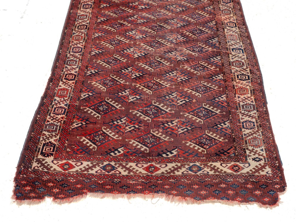 Antique 19th Century Yomut Turkmen Hand-woven Carpet with Dyrnak Guls, 301 × 174 cm (9'11