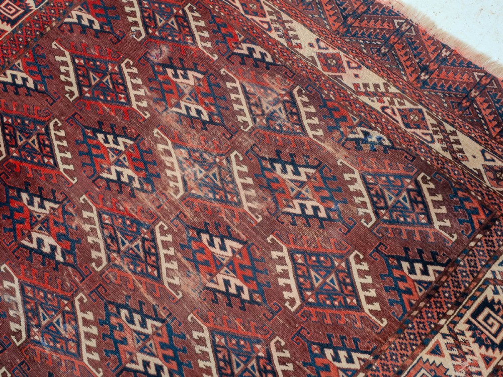 Antique 19th Century Yomut Turkmen Hand-woven Carpet with Dyrnak Guls, 301 × 174 cm (9'11