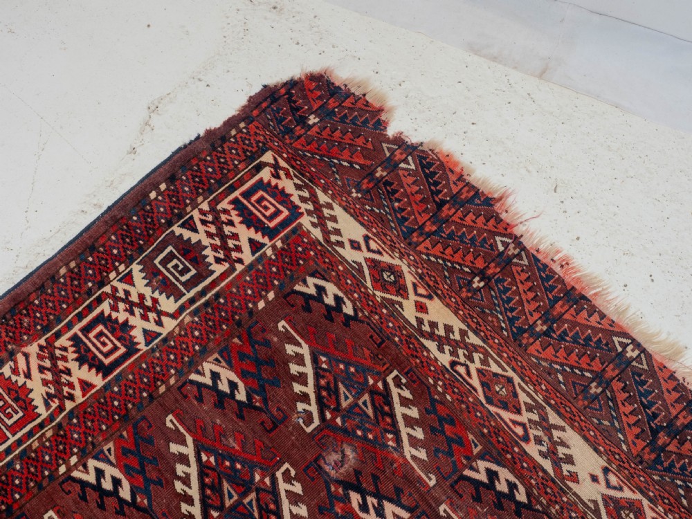 Antique 19th Century Yomut Turkmen Hand-woven Carpet with Dyrnak Guls, 301 × 174 cm (9'11