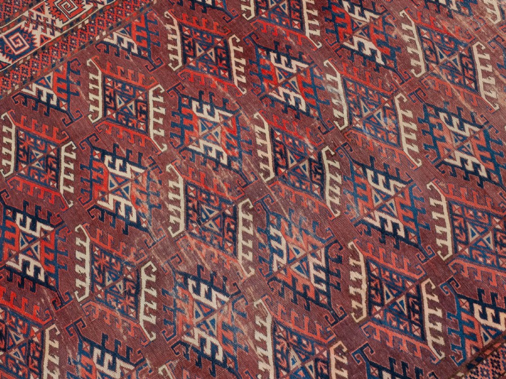 Antique 19th Century Yomut Turkmen Hand-woven Carpet with Dyrnak Guls, 301 × 174 cm (9'11