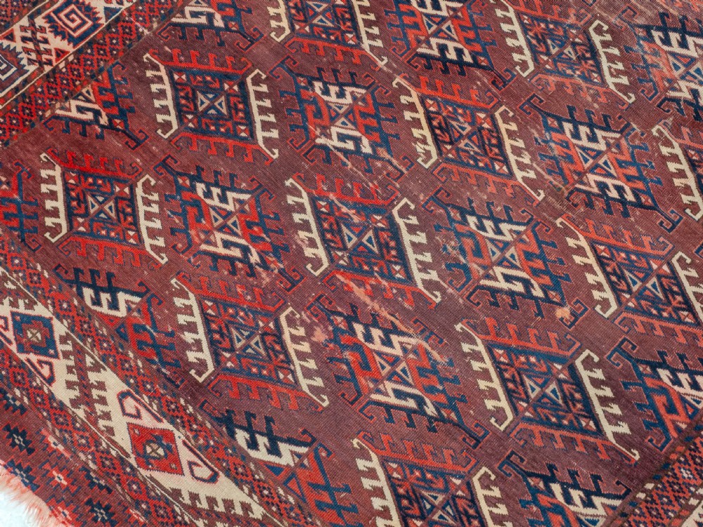 Antique 19th Century Yomut Turkmen Hand-woven Carpet with Dyrnak Guls, 301 × 174 cm (9'11