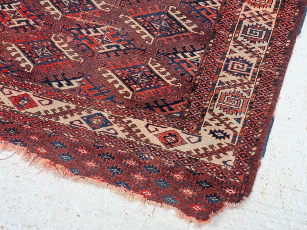 Antique 19th Century Yomut Turkmen Hand-woven Carpet with Dyrnak Guls, 301 × 174 cm (9'11