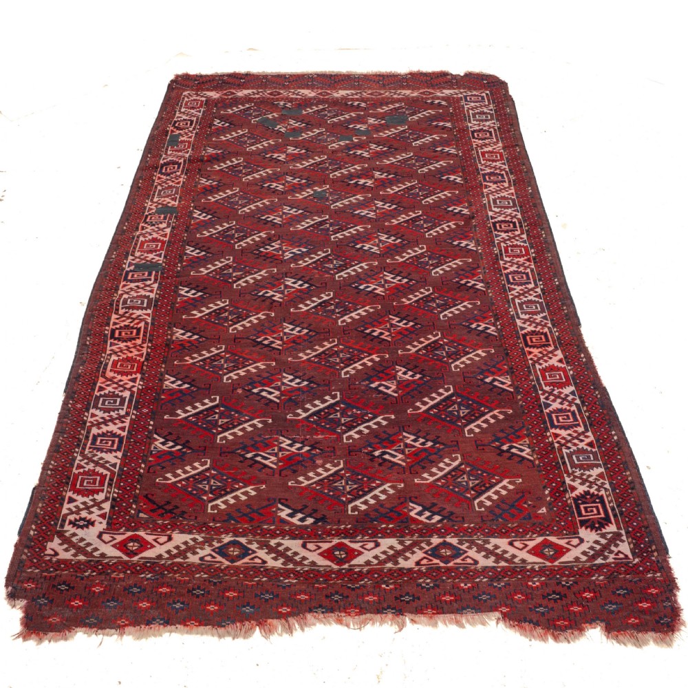 Antique 19th Century Yomut Turkmen Hand-woven Carpet with Dyrnak Guls, 301 × 174 cm (9'11