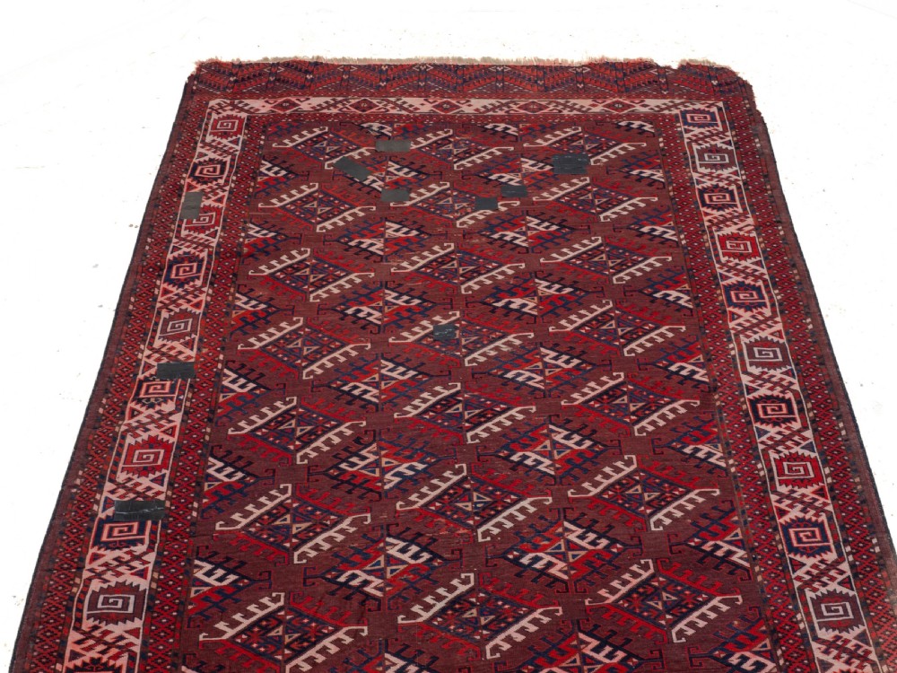 Antique 19th Century Yomut Turkmen Hand-woven Carpet with Dyrnak Guls, 301 × 174 cm (9'11