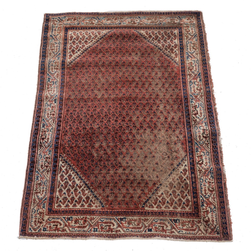 A rectangular late 19th-century handwoven Persian Mir Seraband rug featuring a repeating boteh pattern in terracotta red, blue, and cream. View IV