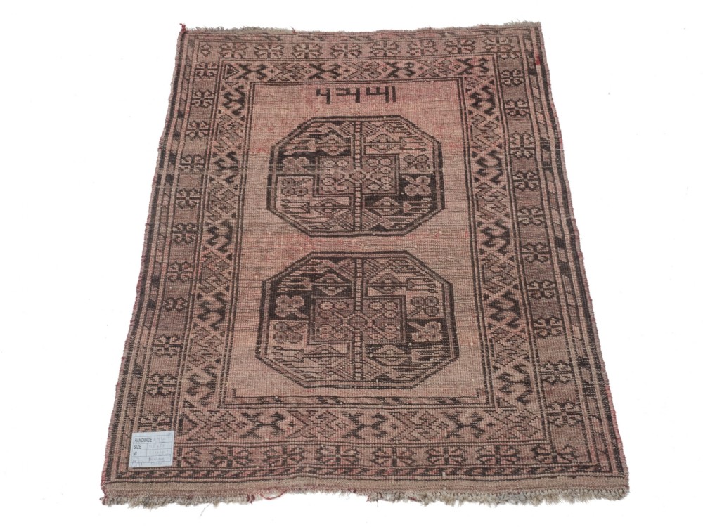 A small rectangular hand-knotted wool rug featuring two central octagonal gul medallions on a faded pink and beige ground with geometric borders. View VIII