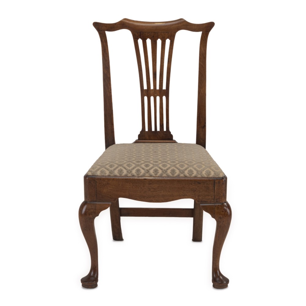 A mid-18th century English walnut side chair featuring a pierced vertical splat back, patterned upholstered seat, and cabriole front legs. View V