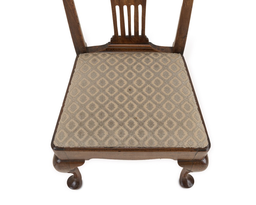 A mid-18th century English walnut side chair featuring a pierced vertical splat back, patterned upholstered seat, and cabriole front legs. View VII