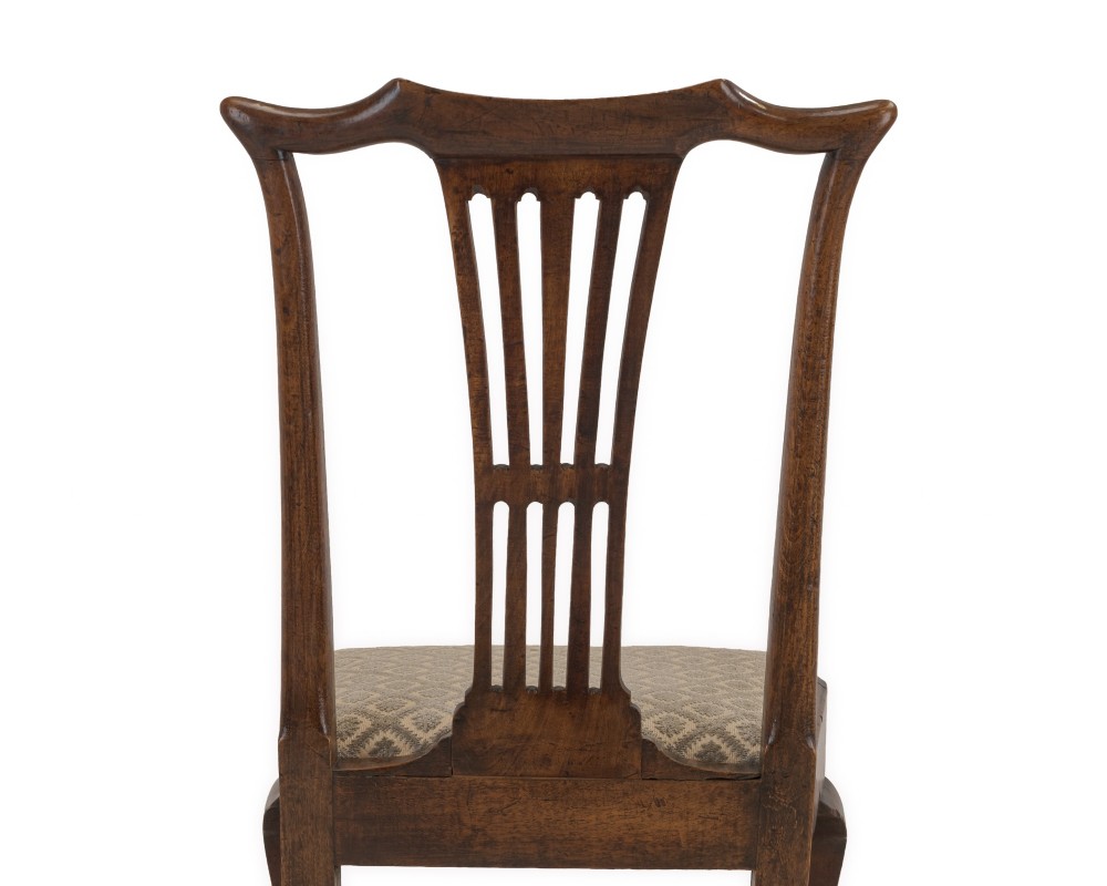 A mid-18th century English walnut side chair featuring a pierced vertical splat back, patterned upholstered seat, and cabriole front legs. View VIII