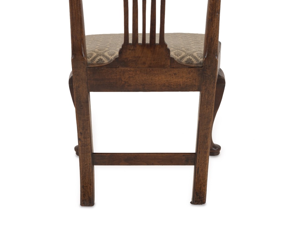 A mid-18th century English walnut side chair featuring a pierced vertical splat back, patterned upholstered seat, and cabriole front legs. View IX