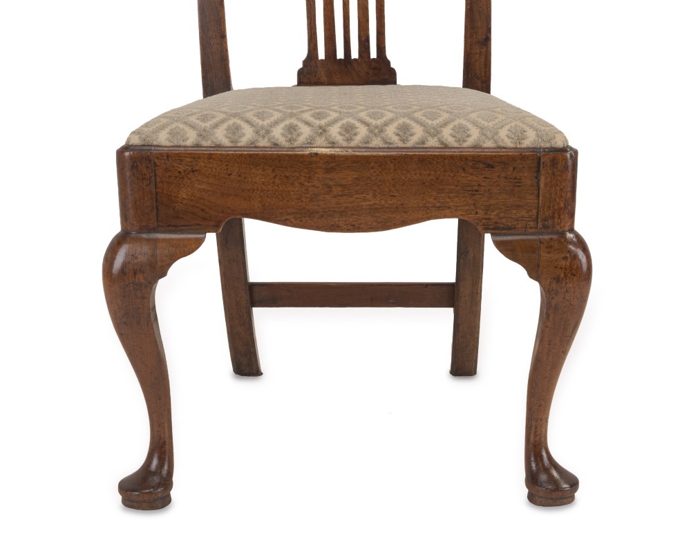 A mid-18th century English walnut side chair featuring a pierced vertical splat back, patterned upholstered seat, and cabriole front legs. View XI