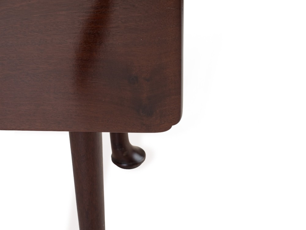 An antique dark walnut drop-leaf gateleg table shown with both extension leaves fully raised and slender turned legs. View VI