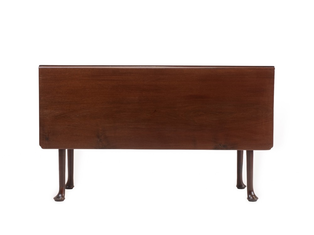 An antique dark walnut drop-leaf gateleg table shown with both extension leaves fully raised and slender turned legs. View VIII