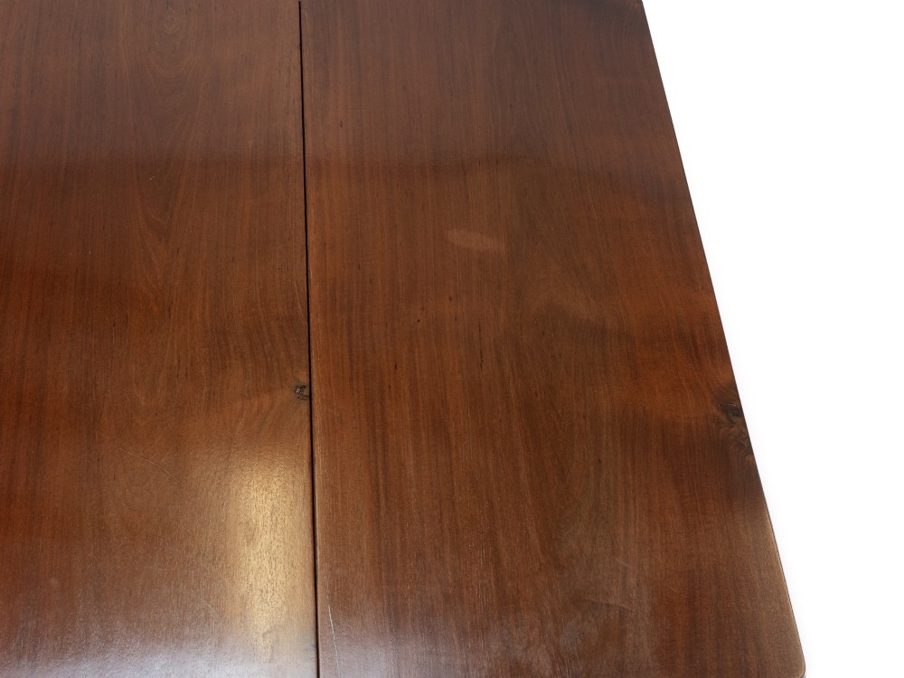 An antique dark walnut drop-leaf gateleg table shown with both extension leaves fully raised and slender turned legs. View XII
