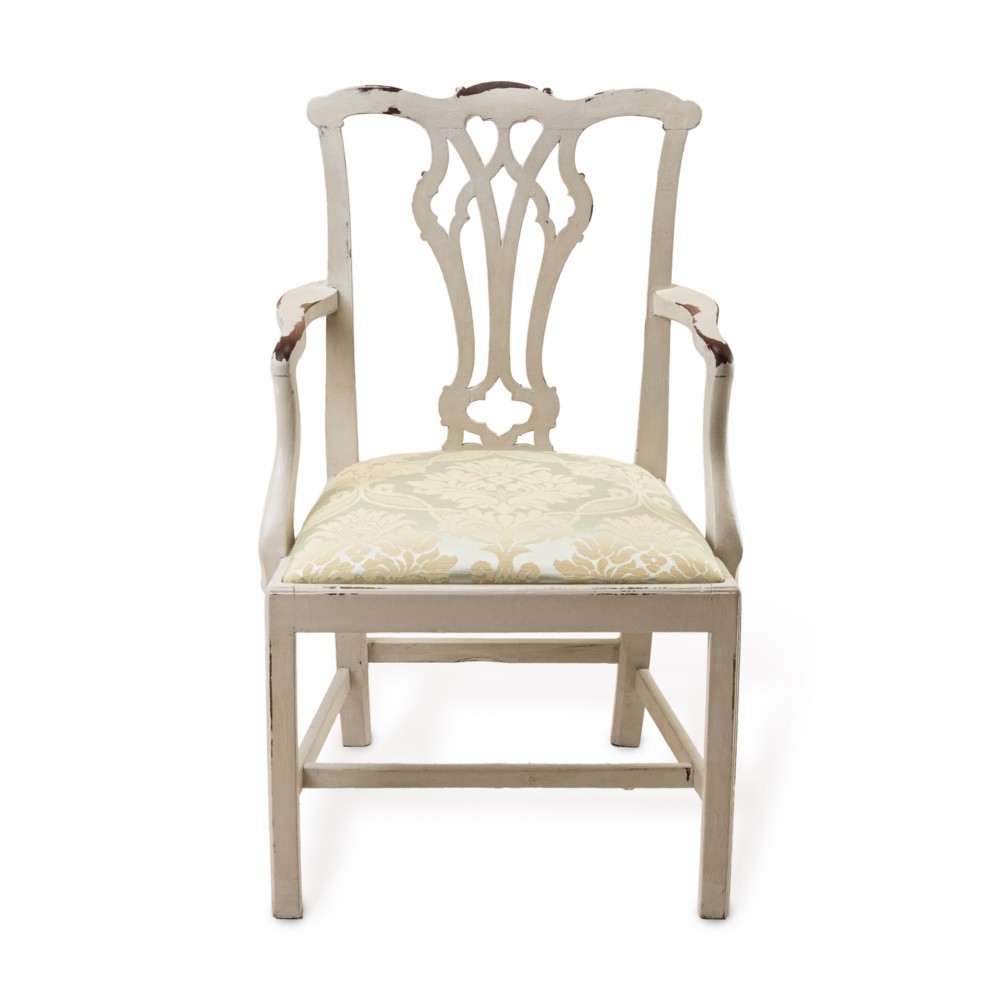 A Georgian Chippendale style armchair featuring an off-white painted finish with visible distressing, a pierced back splat, and a patterned fabric seat. View II