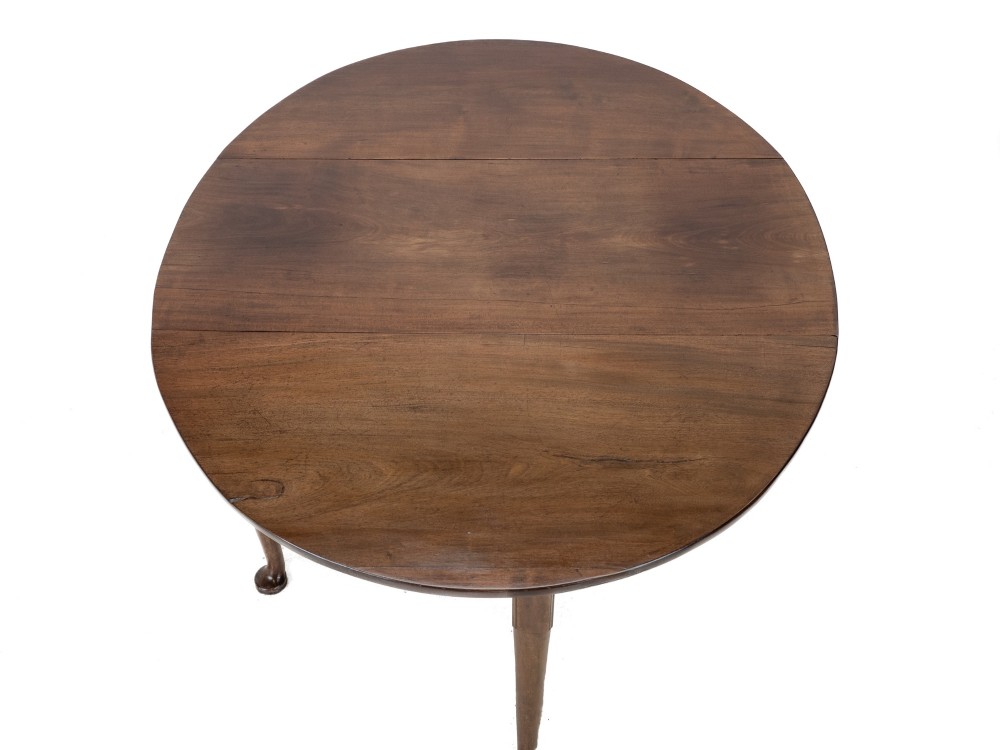 A George II mid-18th century dark mahogany oval drop-leaf table with slender legs ending in pad feet. View IX
